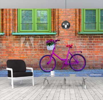 Picture of Pink bike standing by the wall